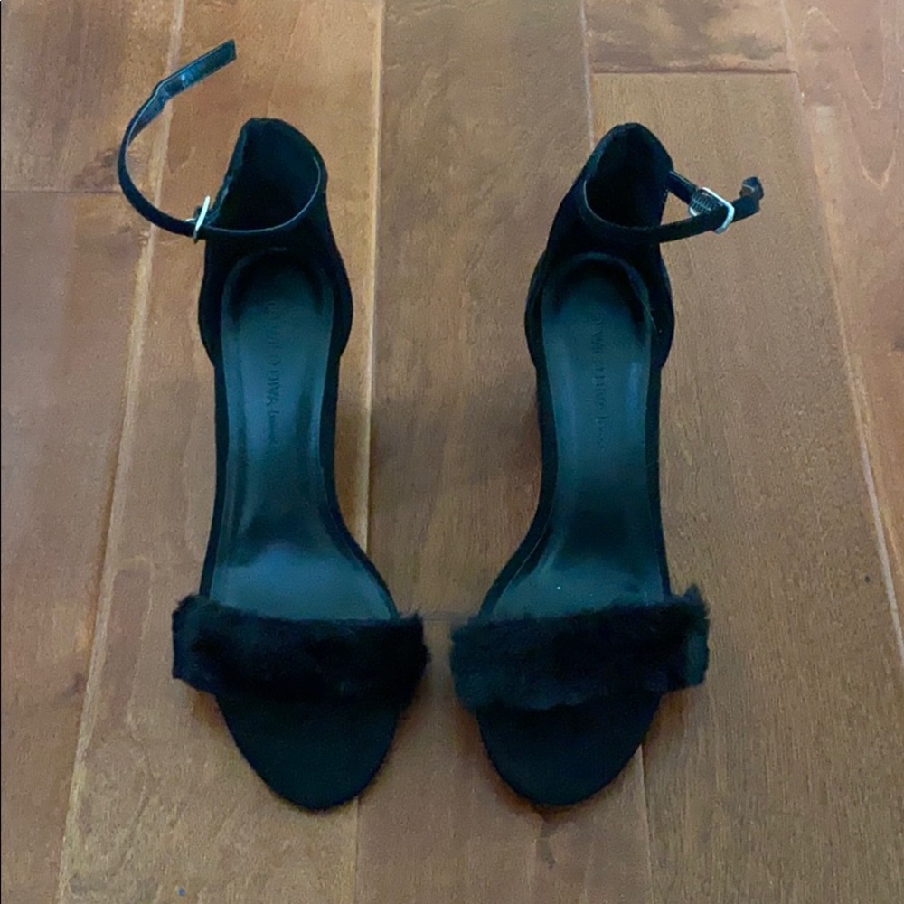 Brand new black block heel with fuzzy strap. Sexy